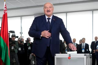 Belarusian President Alexander Lukashenko casts his ballot at a polling site on Sunday during voting in an orchestrated election guaranteed to give the 70-year-old autocrat another term in power